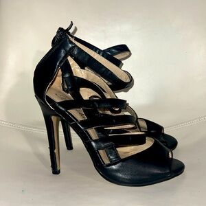 Black heel with front straps